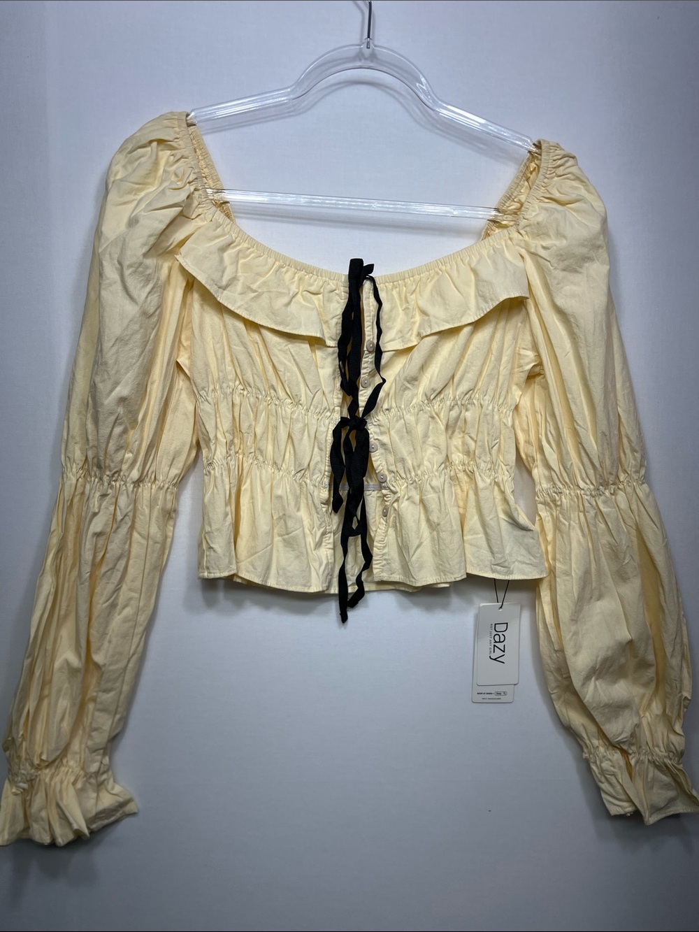 Dazy Lemon Off-Shoulder Peasant Top with Black Tie